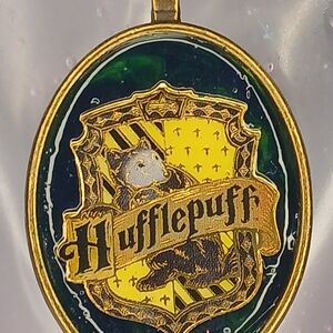 Hufflepuff Crest Pendant. Made from Melted Crayon.